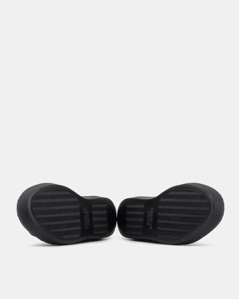 Non-Slip Sole Navy Dress Sneaker in Black Soles