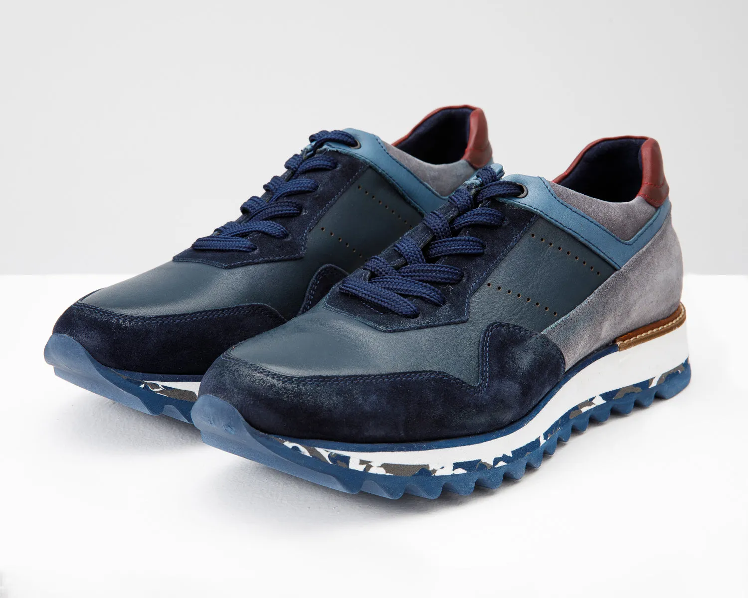 The Hoskova Navy Blue Leather Men Sneaker StreamlinedDesign Trend-setting silhouette